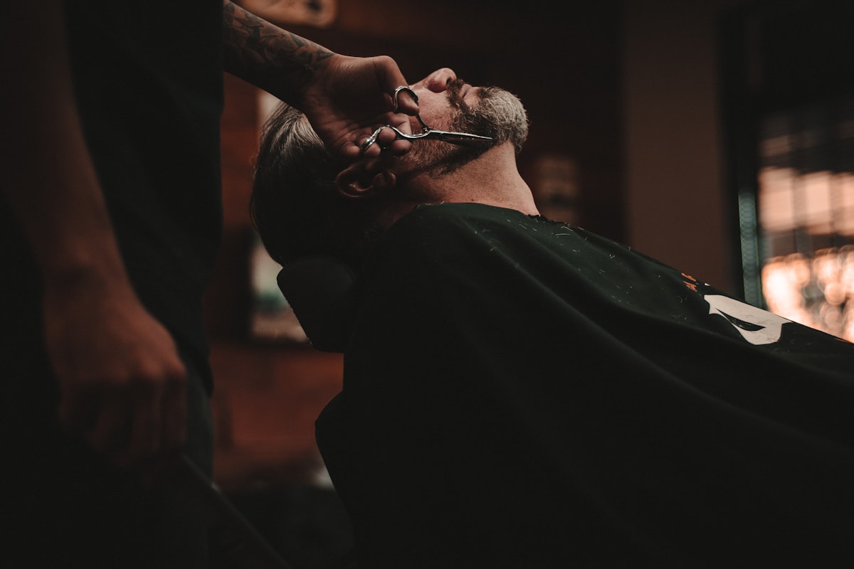 Man getting a classic cut in the barber chair